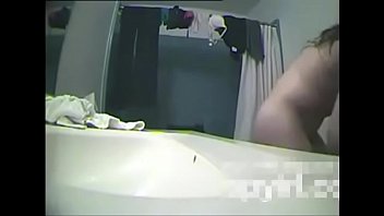 teen brunette getting changed in the bathroom - 3 min